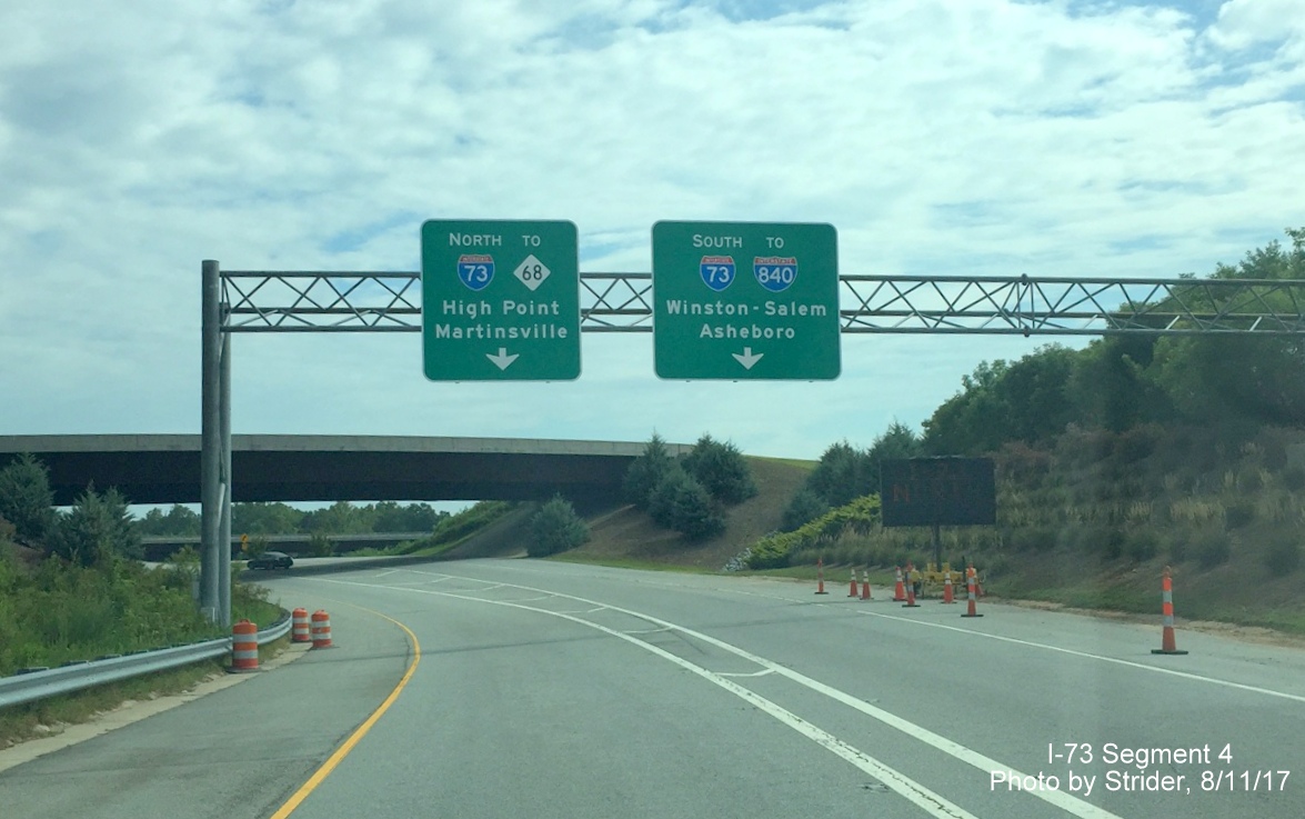 Image of overhead signage at split of ramp from PTI Airport to I-73 North or South, by Strider