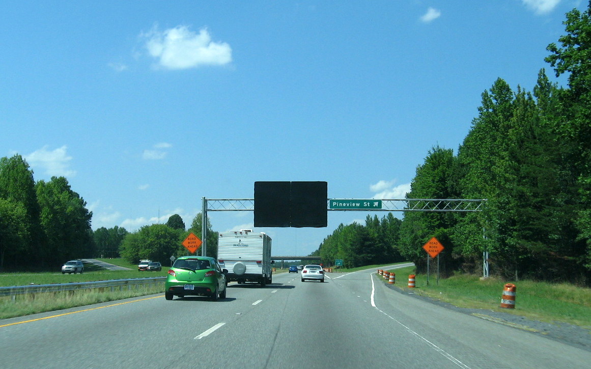 Photo of overhead sign assembly approaching Future I-74 interchange with 
US 220 (I-73) North, July 2012