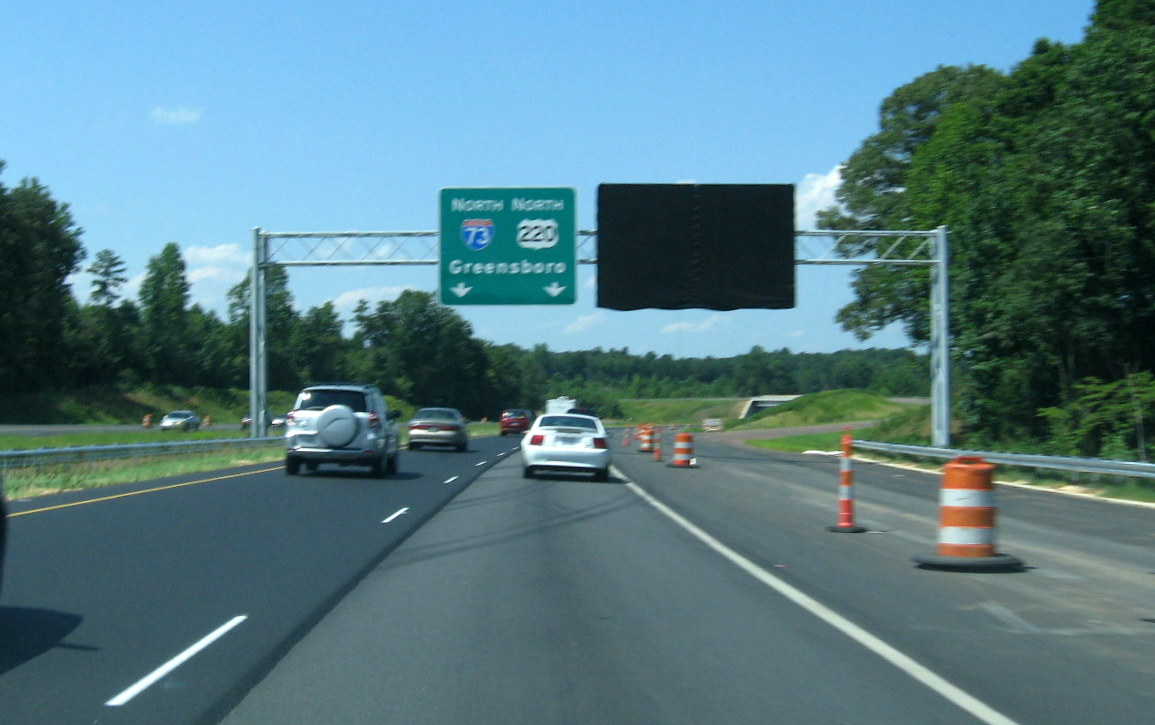 Photo of new overhead signage placed in July 2012 and covered at future I-74 
exit on US 220 (Future I-73) North