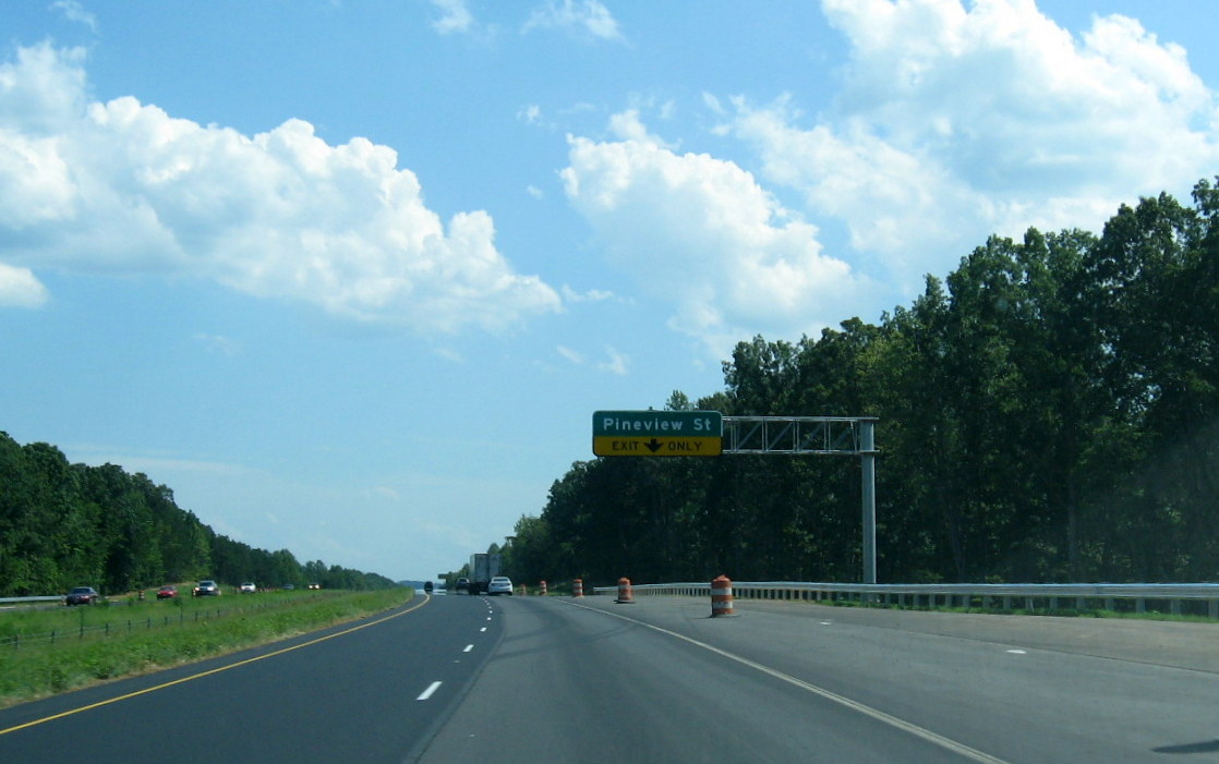 Photo of new overhead exit sign for Pineview Street on US 220 (Future I-73) 
South, July 2012