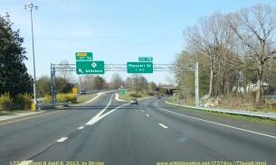 Photo of overhead signs at the NC 42 exit along I-73, US 220 North/I-74 West 
in Asheboro, Apr 2013