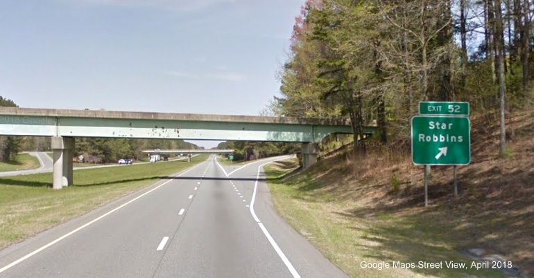 Google Maps Street View image of interstate standard exit sign for Star Robbins put up in the fall of 2013 on 
        I-73/US 220 South, I-74 East