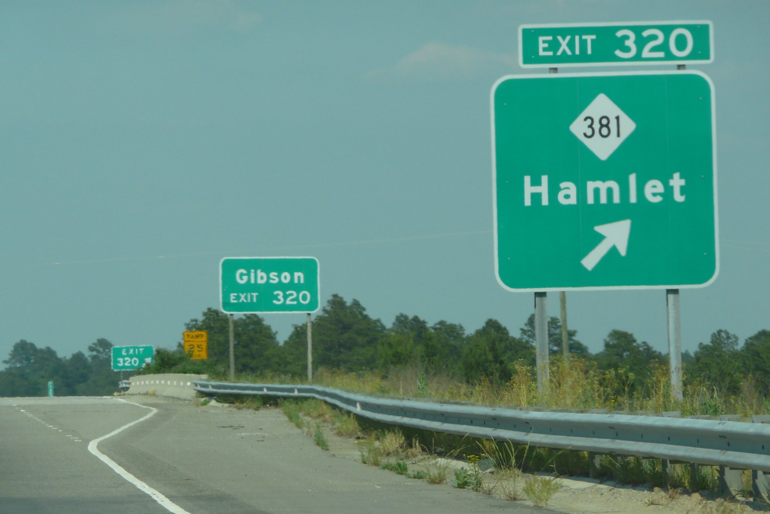 Photo of exit signage for the NC 381 Exit along the US 74 Rockingham
       Bypass in 2009, Courtesy of James Mast