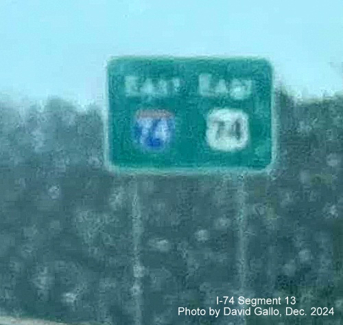 Image of newly placed East I-74/US 74 reassurance marker sign on US 74 Rockingham 
	  Bypass in the rain, photo by David Gallo, December 2024