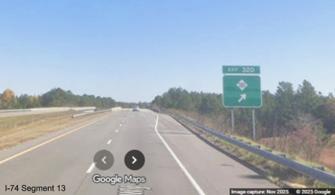 Image of new ground mounted ramp sign for the NC 381 exit on I-74/US 74 East 
	  Rockingham Bypass in Hamlet, Google Maps Street View, November 2025