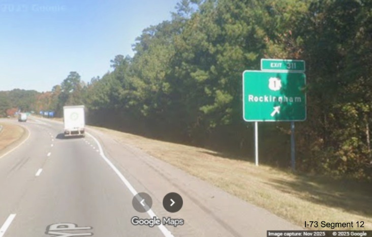 Image of new ground mounted ramp sign for US 1 exit on I-74/US 74 West  
	in Rockingham, Google Maps Street View, November 2025