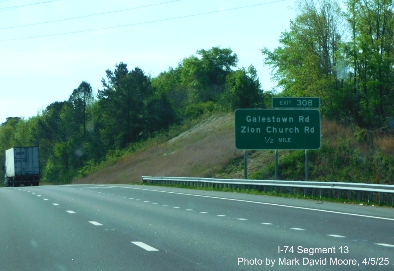 Image of new signage for former Cordova exit on I-74/US 74 East after interchange
		with the Rockingham Bypass by Mark David Moore, April 2025