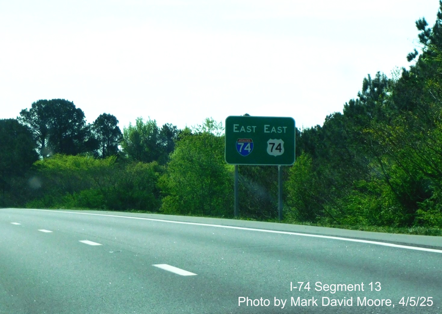 Image of first East I-74/US 74 East reassurance marker after interchange
		with the Rockingham Bypass by Mark David Moore, April 2025