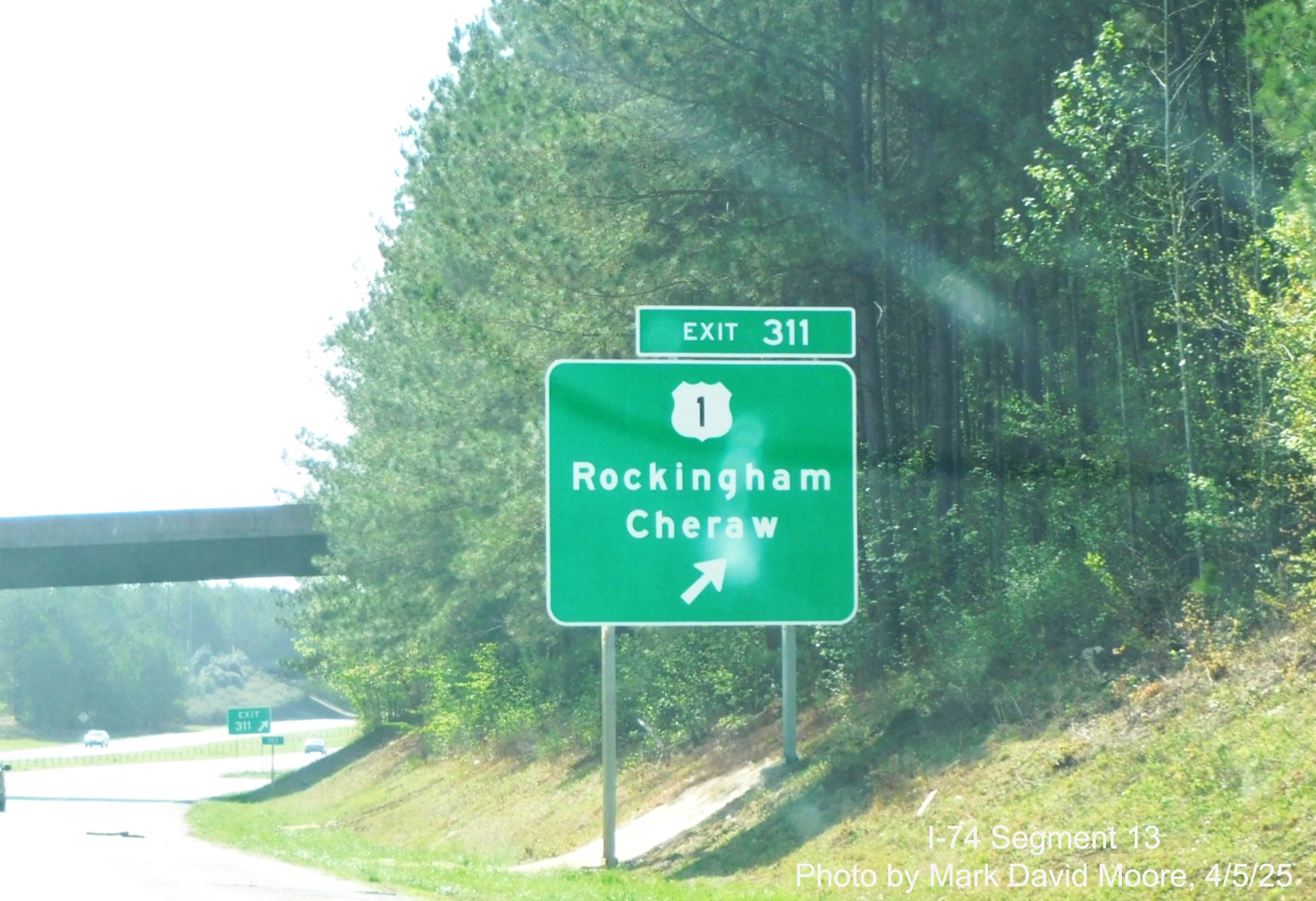 Image of new ramp signage for US 1 exit on I-74/US 74 East in
		Rockingham by Mark David Moore, April 2025