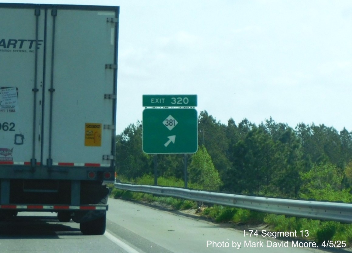 Image of new ground mounted ramp sign for NC 381 exit on I-74/US 74 East in Hamlet,
	  by Mark David Moore, April 2025
