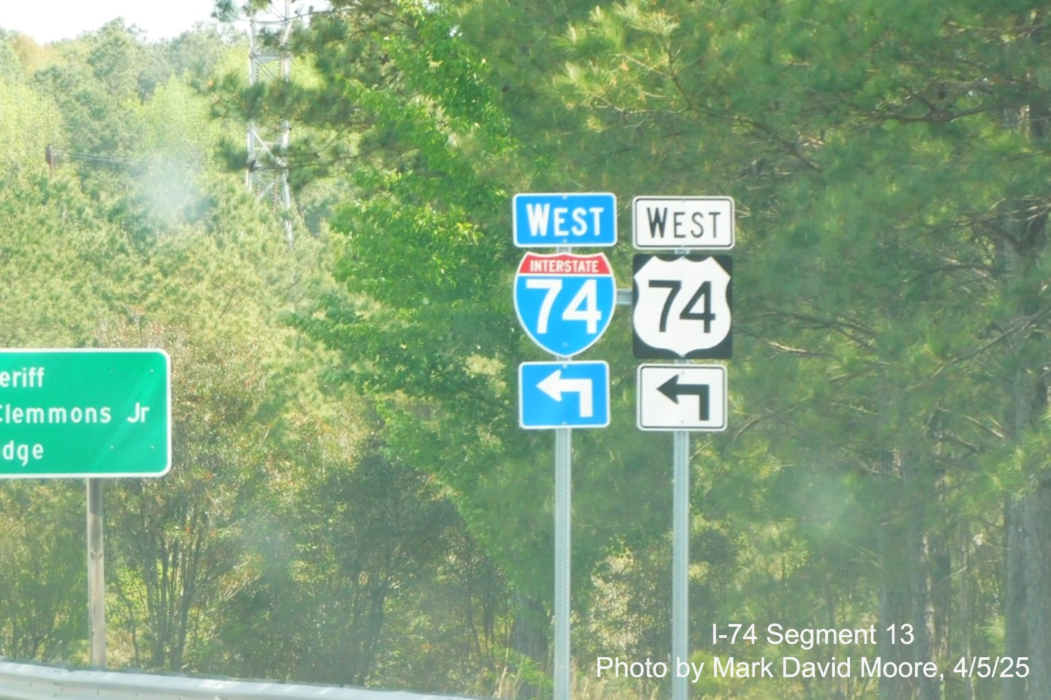 Image of new West I-74 trailblazer approaching ramp on US 1 North to I-74/US 74 West in
		Rockingham by Mark David Moore, April 2025