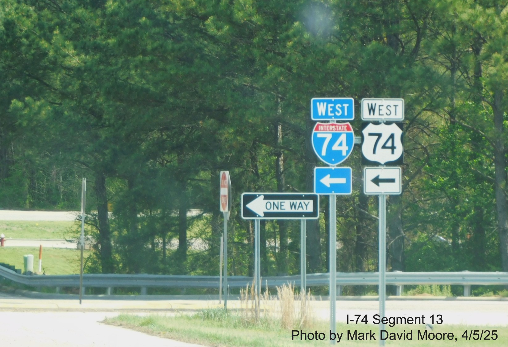 Image of new West I-74 trailblazer at ramp on US 1 North to I-74/US 74 West in
		Rockingham by Mark David Moore, April 2025