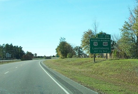 Photo of exit signage for Bus. 15/401 on Laurinburg Bypass with wrong 
exit number in Jan. 2007