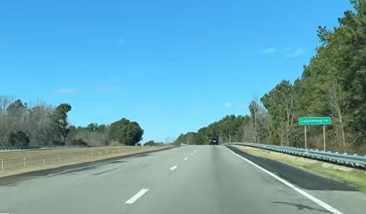 Image of newly paved shoulders on both sides of US 74 (Future I-74) West in 
	  Maxton, screen grab from Mileage Mike video, January 2026