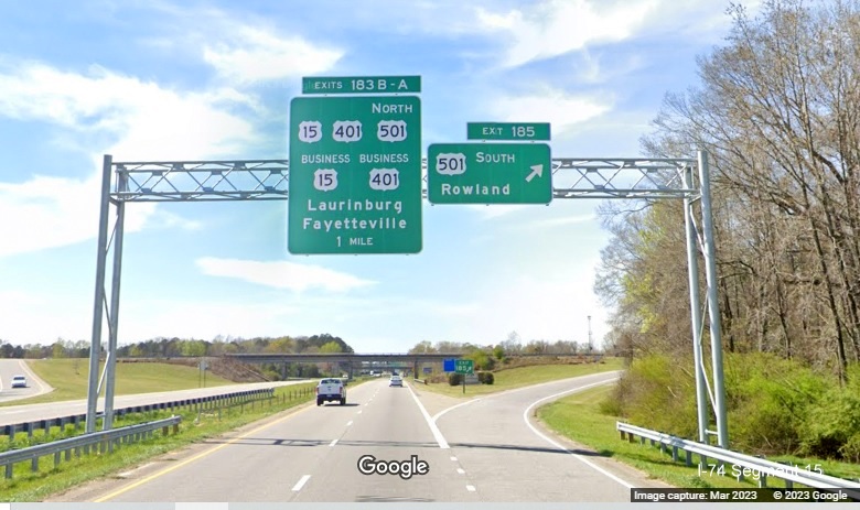 Image of new overhead signs for US 15, US 401, US 501 North and US 501 South exits on US 74 (Future I-74) West 
        in Laurinburg, Google Maps Street View, March 2023