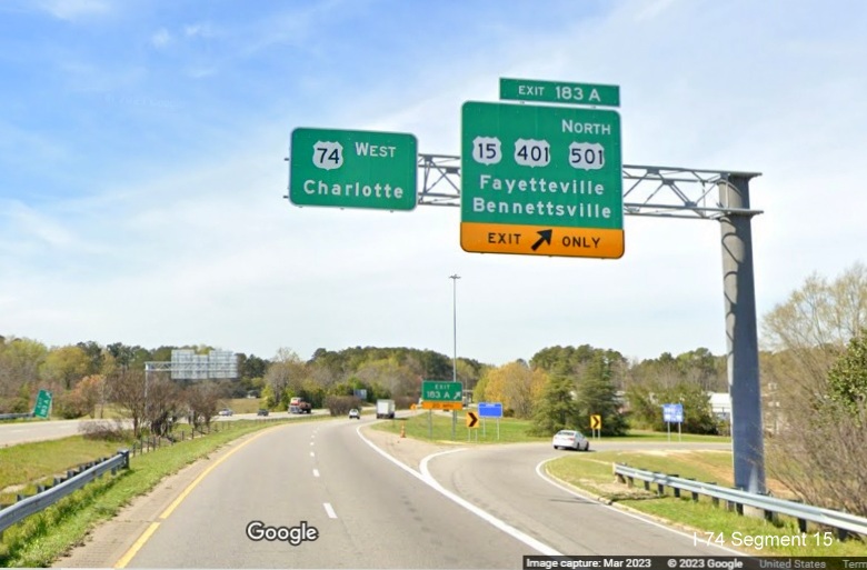 Image of new overhead signage with US 74 West pull through at ramp for US 15/401/501 North exit on 
        US 74 (Future I-74) West in Laurinburg, Google Maps Street View, March 2023