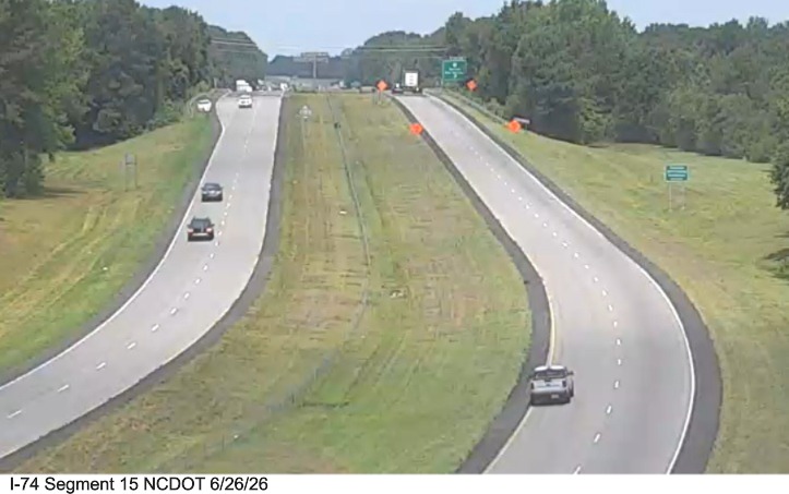 NCDOT Traffic Camera image of shoulder widening on US 74 (Future I-74) in Maxton
	 showing the placement of 4 foot right shoulders, NCDOT, June 2026