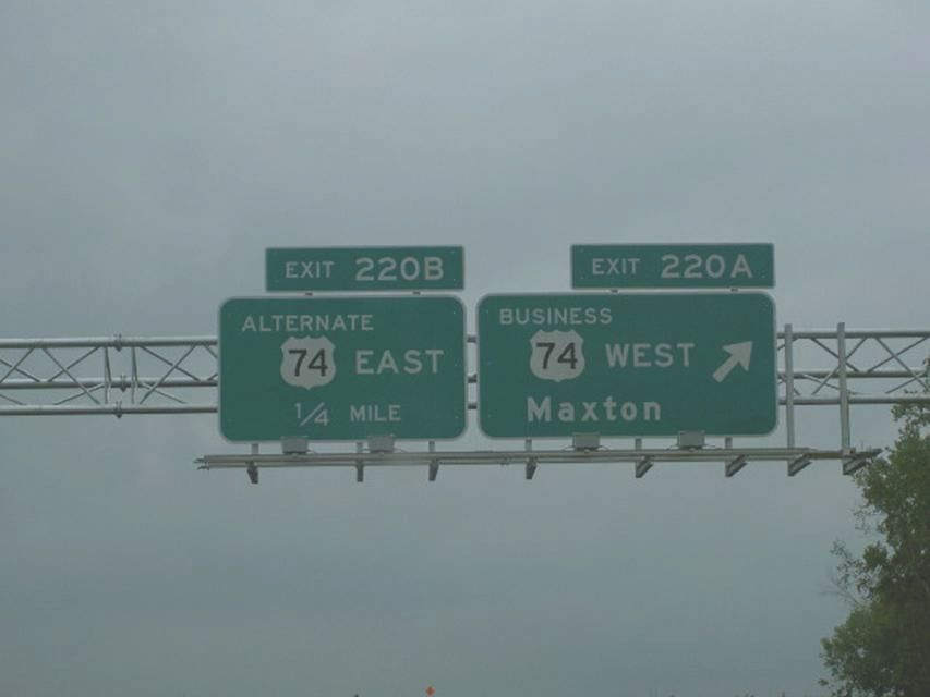 Photo of first exit signs on new stretch of I-74 freeway near Maxton in 
August 2007, courtesy of Nick Hudson