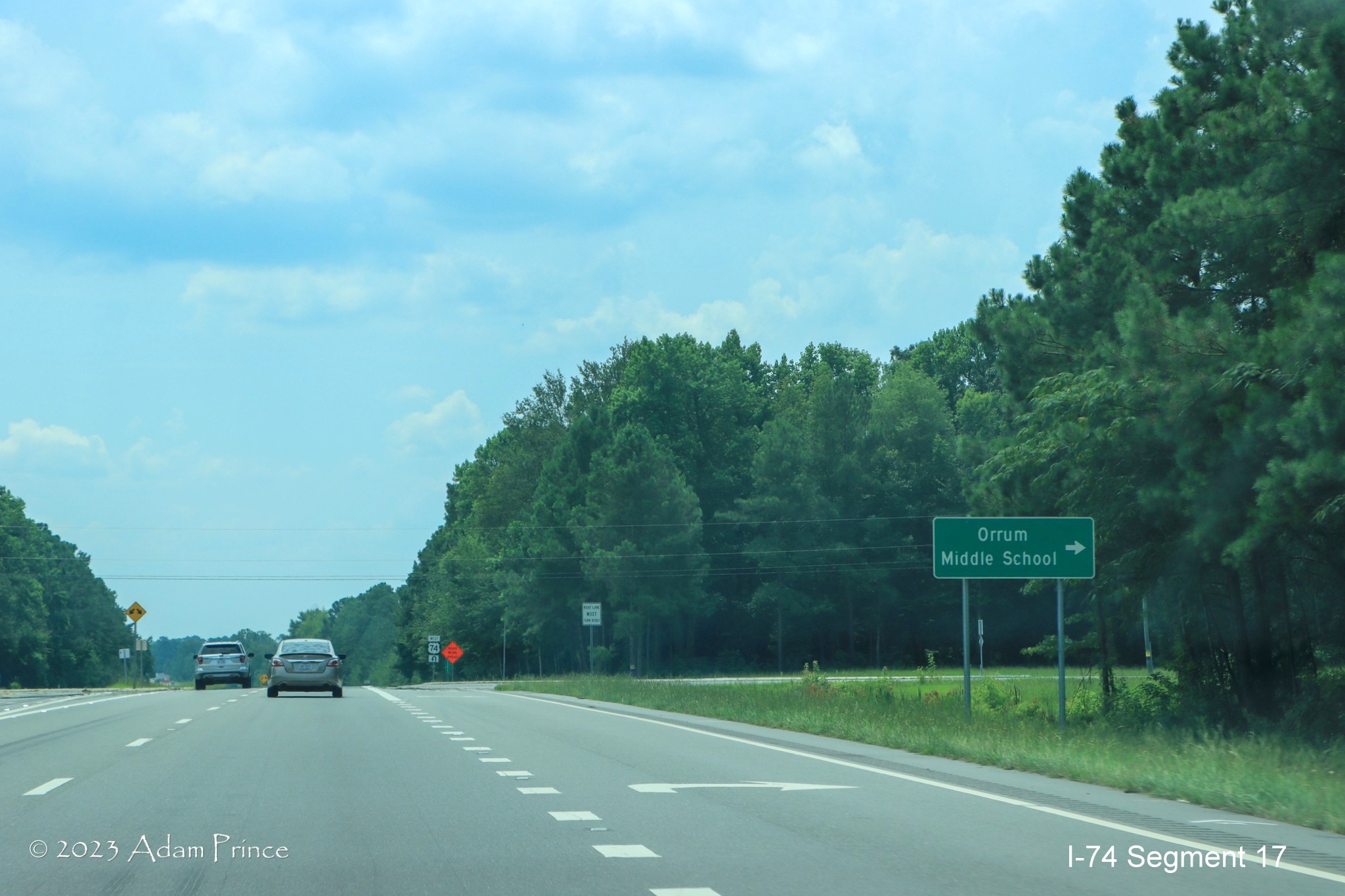 Image of signage on US 74 East approaching the Creek Road intersection just prior to the NC 
        72/NC 130 interchange construction zone, Adam Prince, July 2023