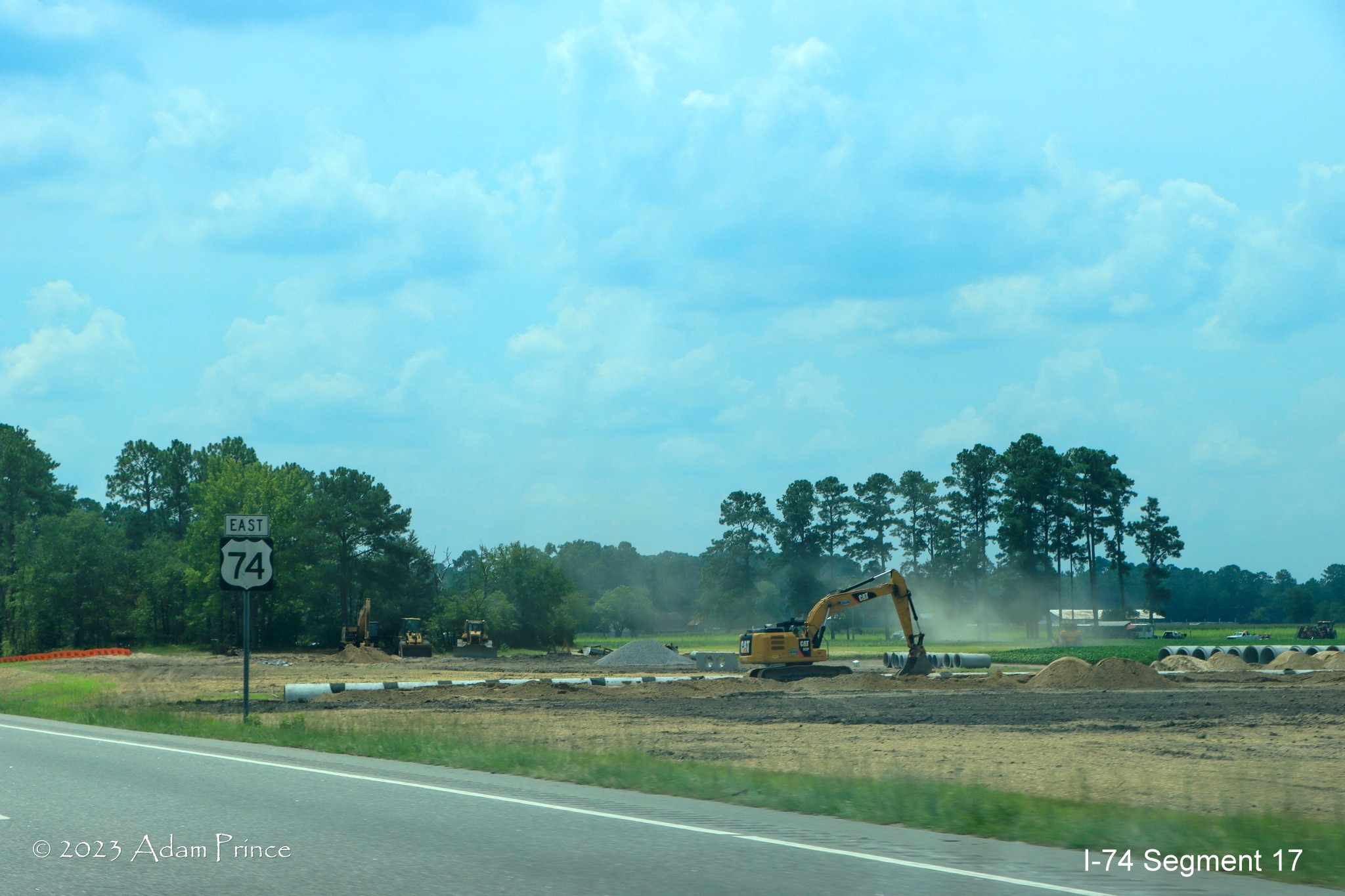 Image of construction activity along US 74 East in the NC 72/NC 130 interchange construction zone, 
        Adam Prince, July 2023