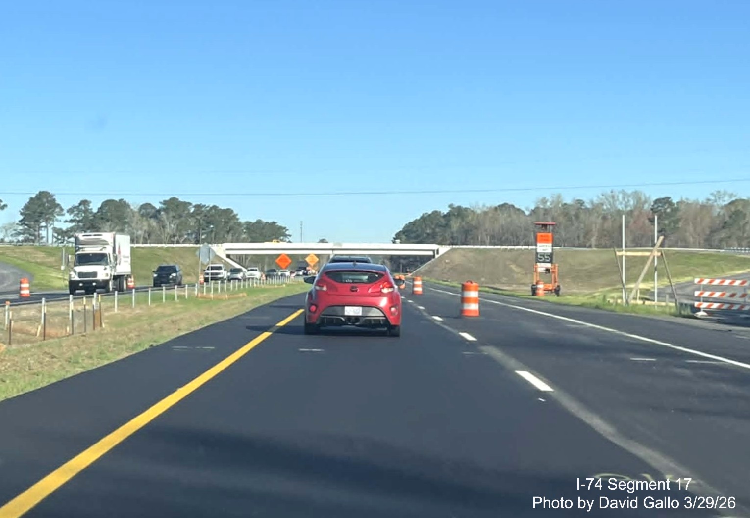 Image passing the future NC 72/ 130 West interchange on US 74 (Future I-74) East in
Robeson County showing line painting complete but signage not, by David Gallo, March 2026