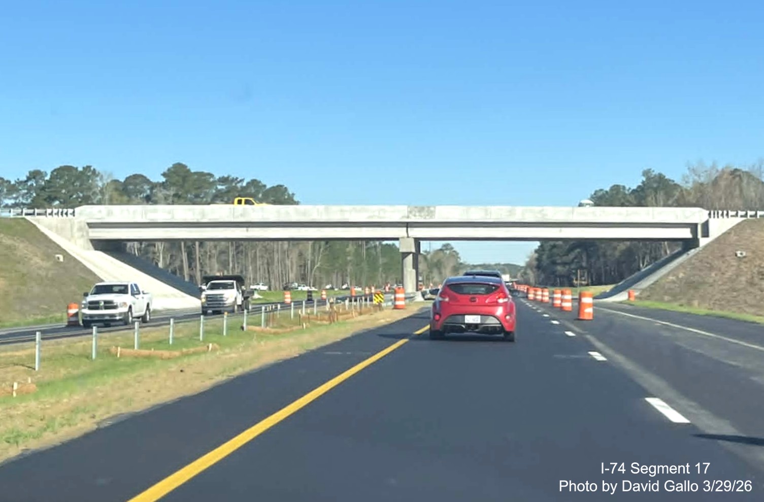 Image approaching the completed NC 72/ 130 West interchange bridge on US 74
(Future I-74) East in Robeson County showing similar progress on westbound lanes, by David Gallo, March 2026