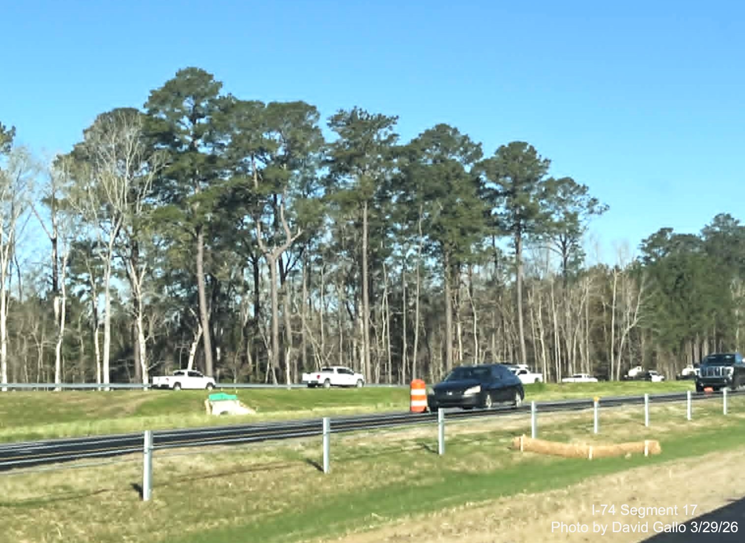 Image of the NC 72/ 130 West interchange ramp from US 74 (Future I-74) West in
Robeson County showing construction vehicles using the unopened ramp. By David Gallo, March 2026