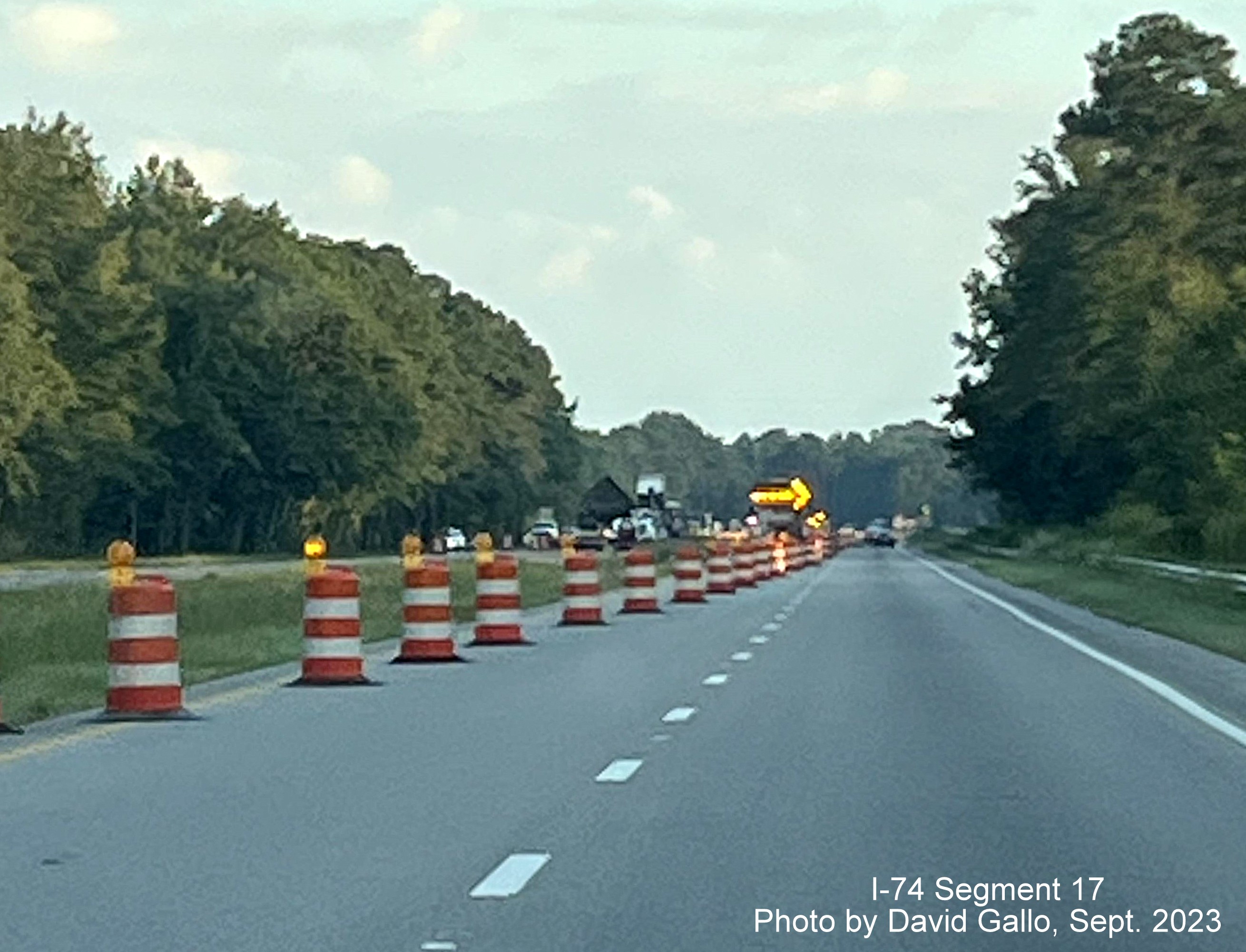 Image of VMS warning of left lane closure at the closed NC 72 intersection on 
         US 74 West in interchange project work zone, David Gallo, September 2023