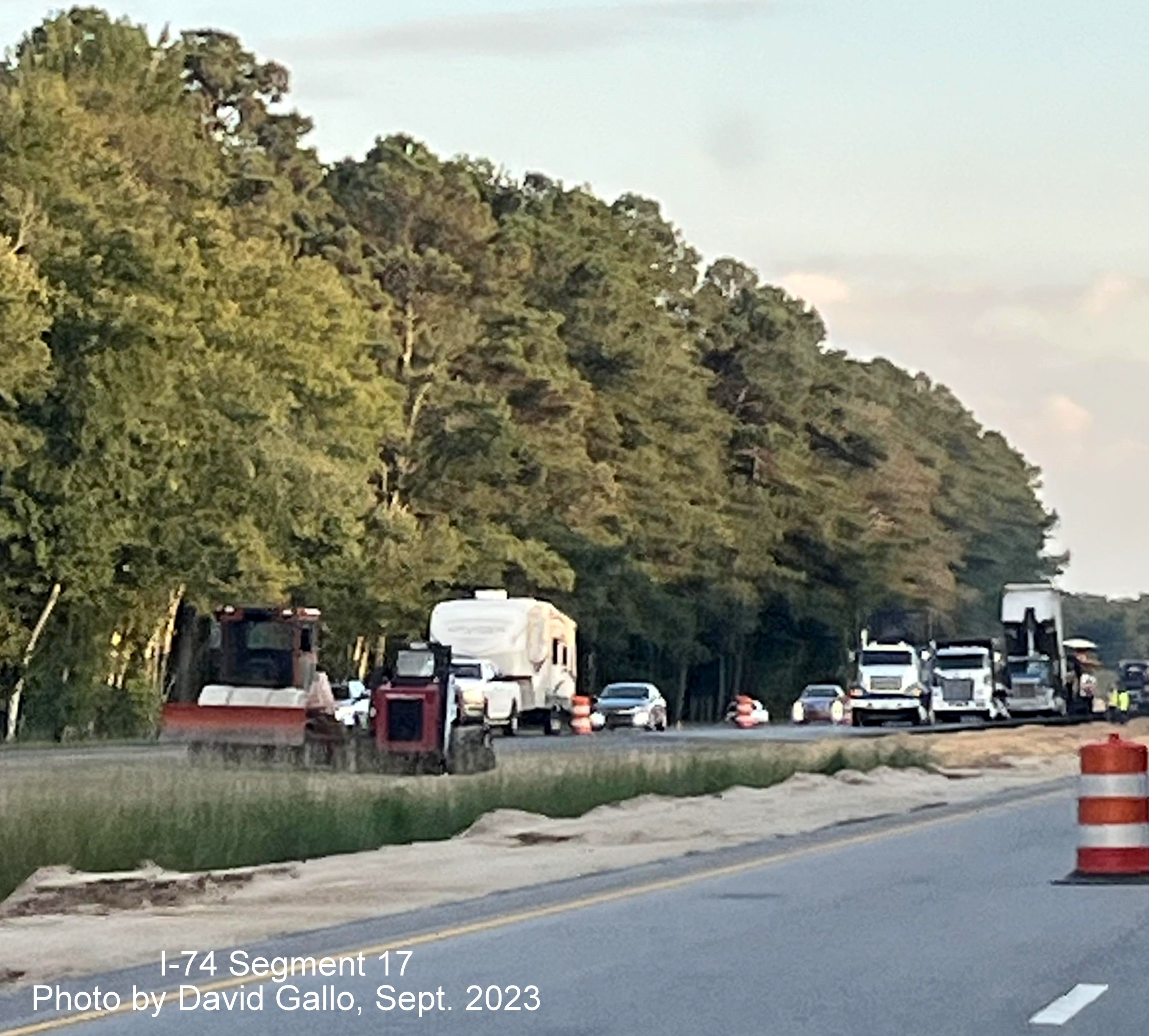Image of grading along closed left lane after the formerly open NC 72 intersection on 
         US 74 West in interchange project work zone, David Gallo, September 2023