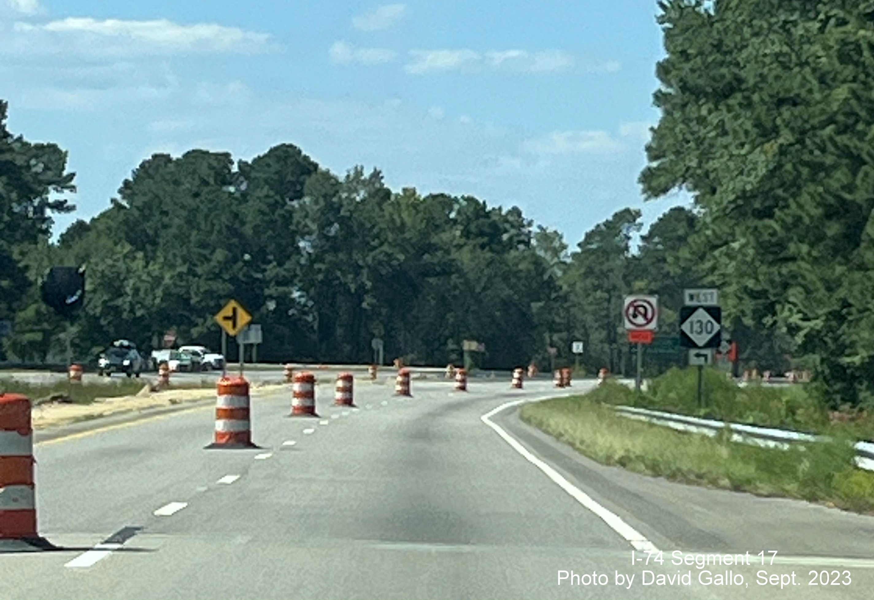Image of left lane closure at NC 130 West intersection in future interchange work zone on US 74 (Future I-74) West, 
       David Gallo, September 2023