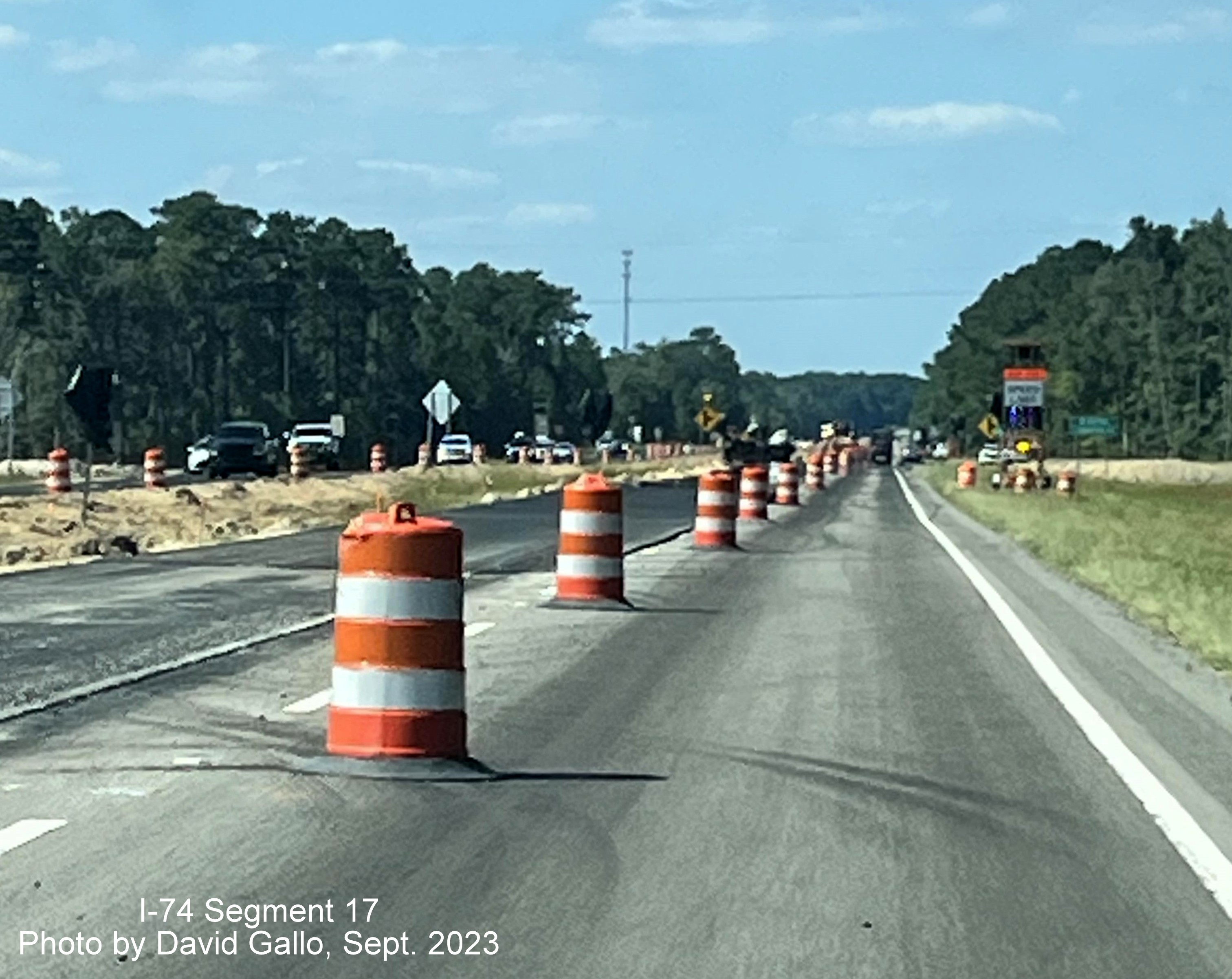 Image of left lane paving after NC 130 West intersection in future interchange work zone on US 74 (Future I-74) West, 
       David Gallo, September 2023