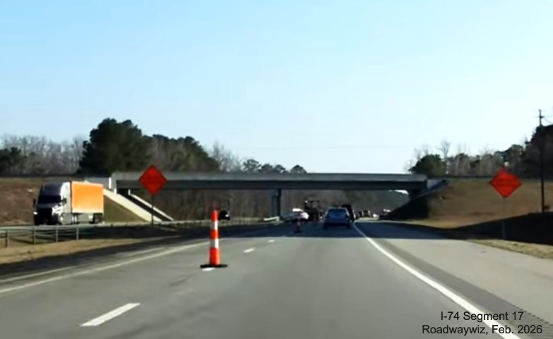 Image approaching Broadridge Road bridge in pavement rehabilitation project work 
	  zone on US 74 (Future I-74) East in Robeson County, Google Maps Street View, February 2026