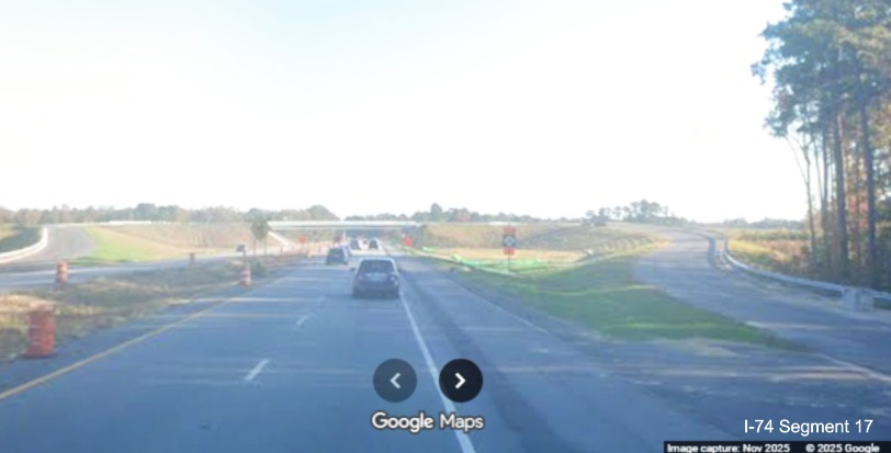 Image approaching future NC 130/71 interchange bridge on US 74 (Future I-74) East 
	  in Robeson County, Google Maps Street View, November 2025
