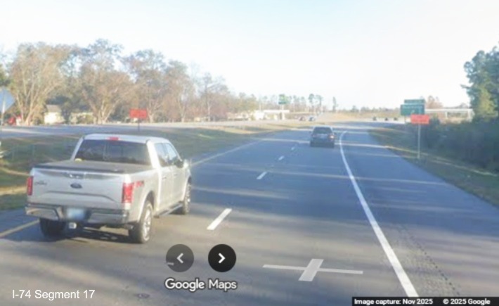 Image of pair of End Construction signs at the end of the US 74 pavement
	  rehabilitation work zone after the Lumber River bridges on US 74 (Future I-74) East in Columbus County, Google Maps Street 
	  View, November 2025