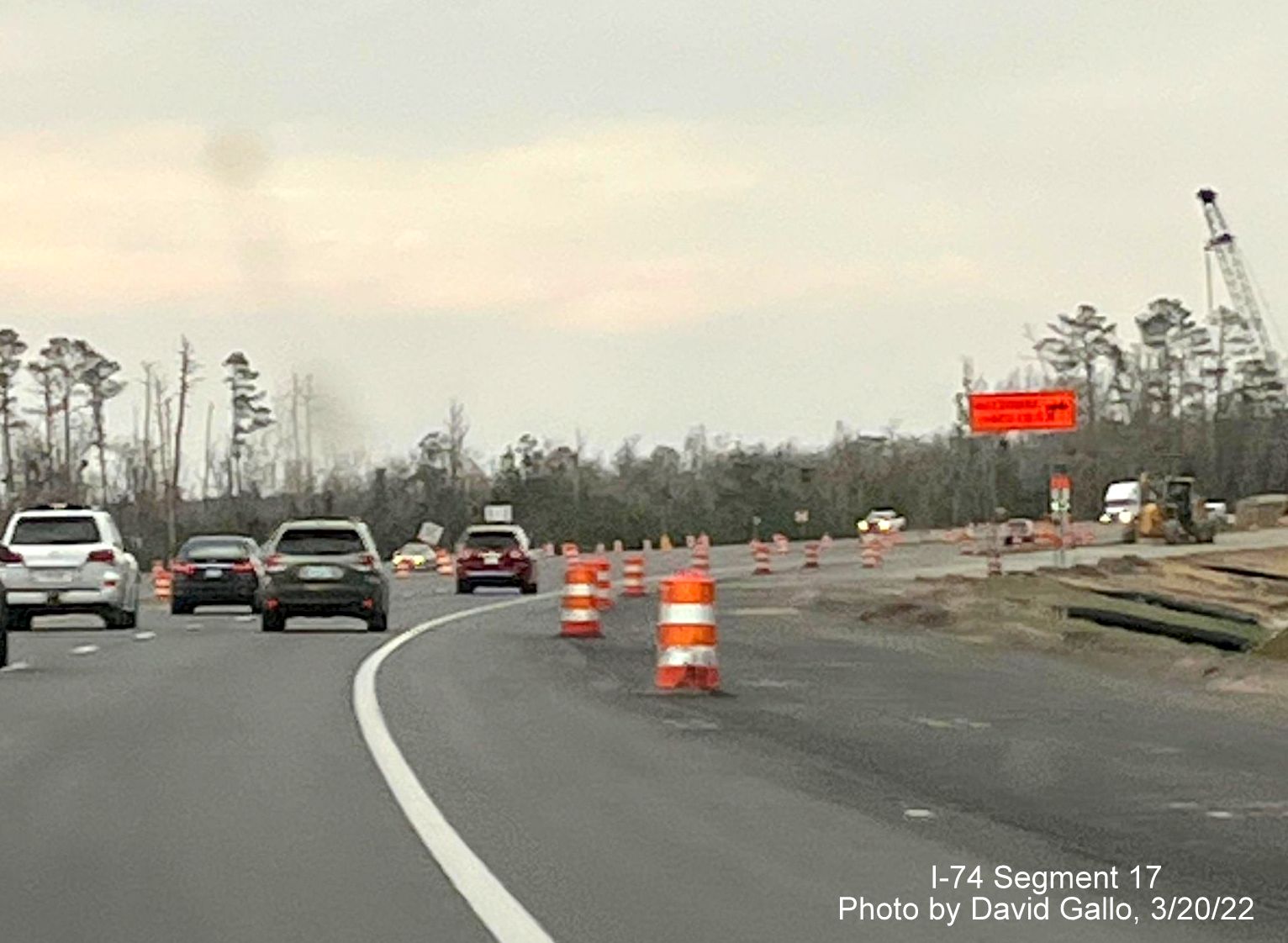 Image of future ramp to Old Boardman Road from US 74 East, 
        by David Gallo, March 2022