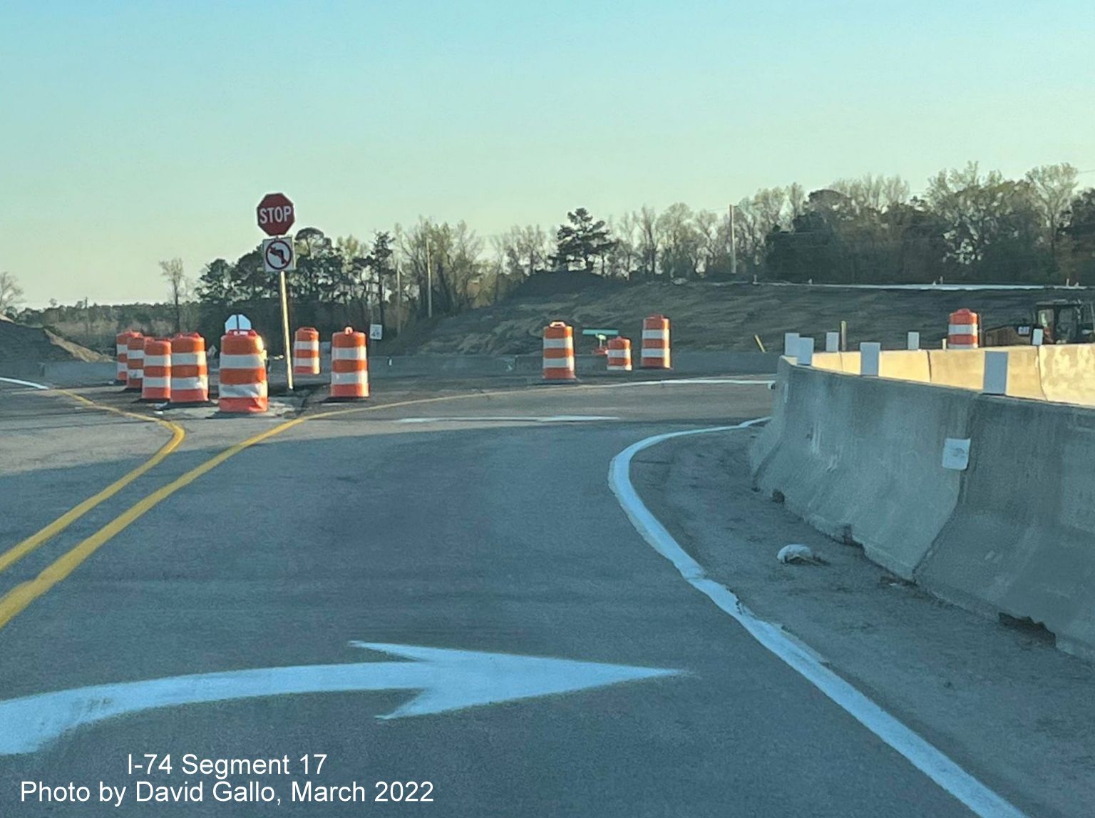 Image from Old Boardman Road of current ramp leading to intersections with US 74 (Future I-74) West, by David Gallo, March 2022
