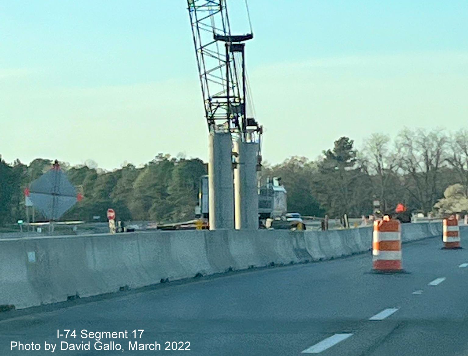 Image of crane helping construct supports for future Boardman interchange bridge on US 74 (Future I-74) West
        , by David Gallo, March 2022