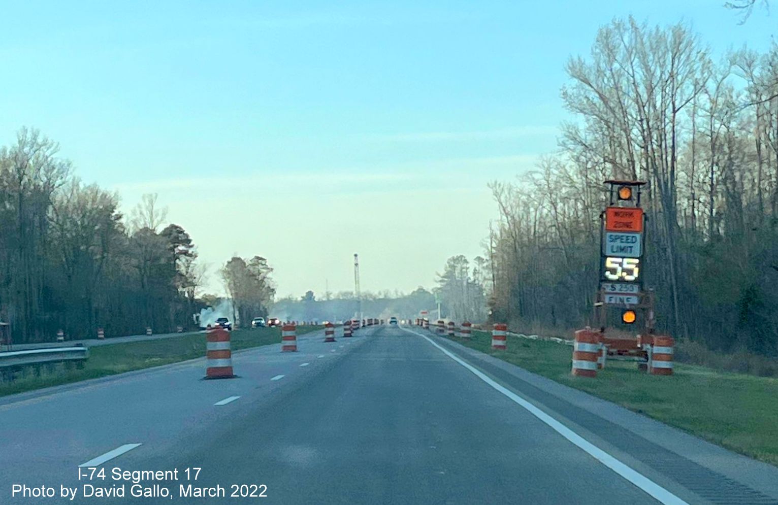 Image of portable Work Zone speed limit on US 74 (Future I-74) West approaching Boardman interchange 
        construction site, by David Gallo, March 2022