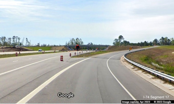 Image of entering exit ramp to Old Boardman Road from US 74/NC 130 East, Google Maps 
        Street View image, April 2023