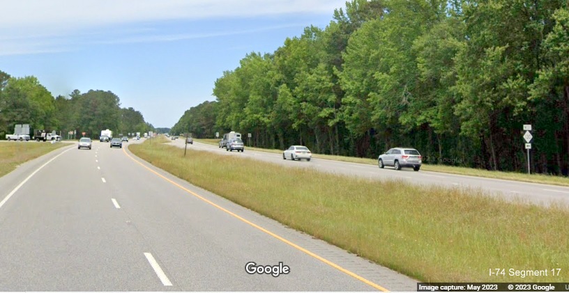 Image of future interchange site at the current intersection of US 74 West and NC 130 West in Robeson 
        County, Google Maps Street View, April 2023