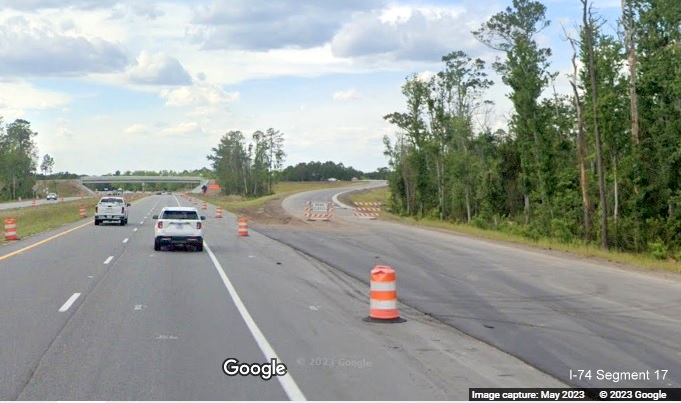 Image of nearly completed exit ramp from US 74/NC 130 West in Boardman prior to Old Boardman Road bridge, Google Maps 
        Street View image, April 2023