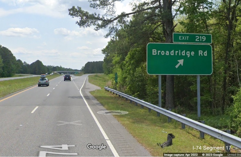 Image of ground mounted ramp sign for Broadridge Road exit on US 74 (Future I-74) East in Robeson County, Google Maps Street View, April 2022