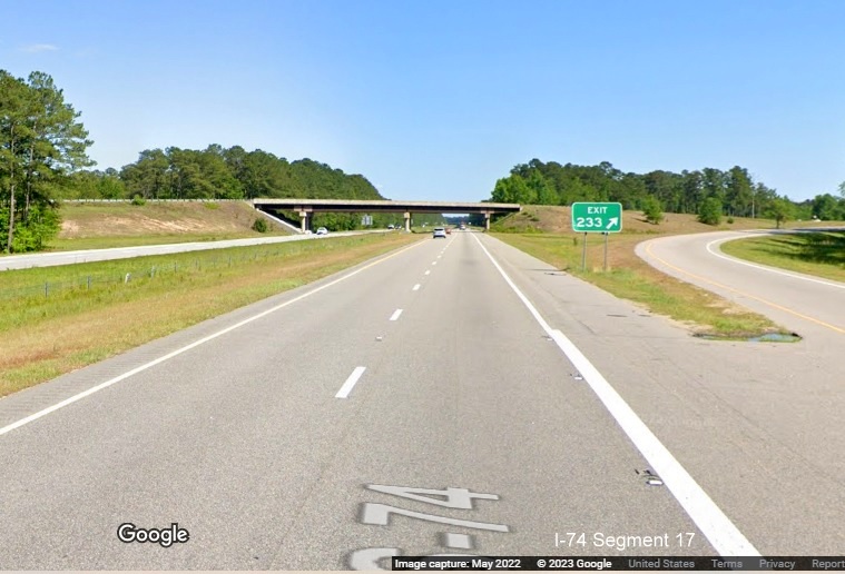 Image of gore sign for NC 410/Business 74/NC 130 East exit on US 74 (Future 
        I-74) East in Columbus County, Google Maps Street View image, May 2022