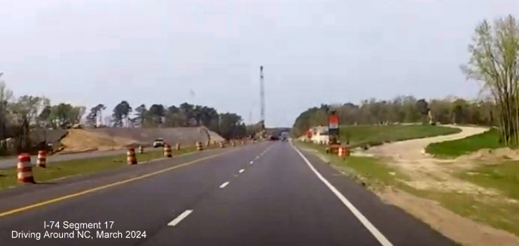Screen grab image approaching future off-ramp to NC 130/72 West on US 74 (Future I-74) West 
       beyond Boardman, Driving Around NC, March 2024