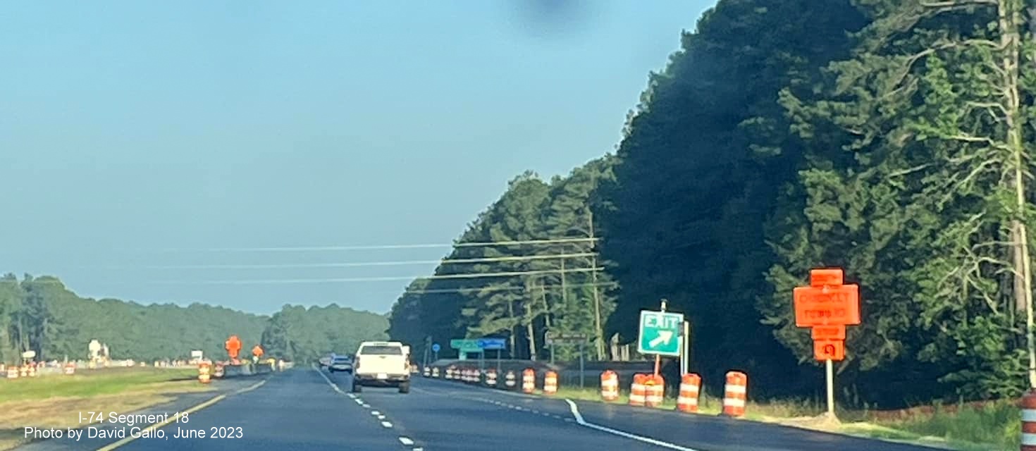 Image construction in future interchange construction area at current
        intersection with Chauncey Town Road on US 74/76 West in Lake Waccamaw, by David Gallo, June 2023