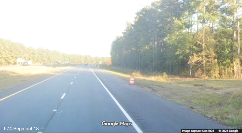 Image of removed former Lake Road intersection after completed Lake Road bridge over 
	  US 74/76 East in Lake Waccamaw, Google Maps Street View, October 2025