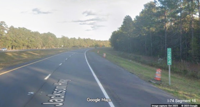 Image of end of inferstate width shoulders after the Lake Road bridge on US 74/76 East 
	  in Lake Waccamaw, Google Maps Street View, October 2025