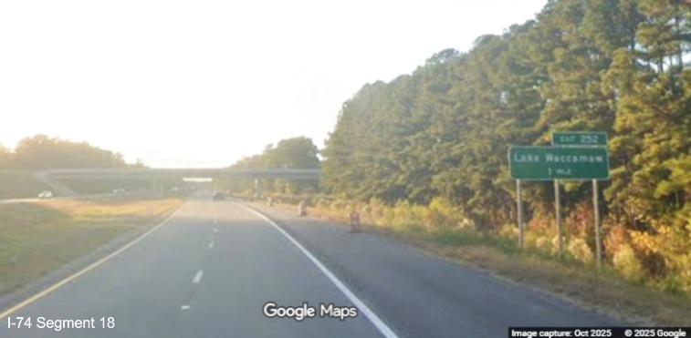 Image of ground mounted 1 Mile advance sign for Lake Waccamaw prior to Lake Road bridge 
	  over US 74/76 (Future I-74) West in Lake Waccamaw, Google Maps Street View, October 2025
