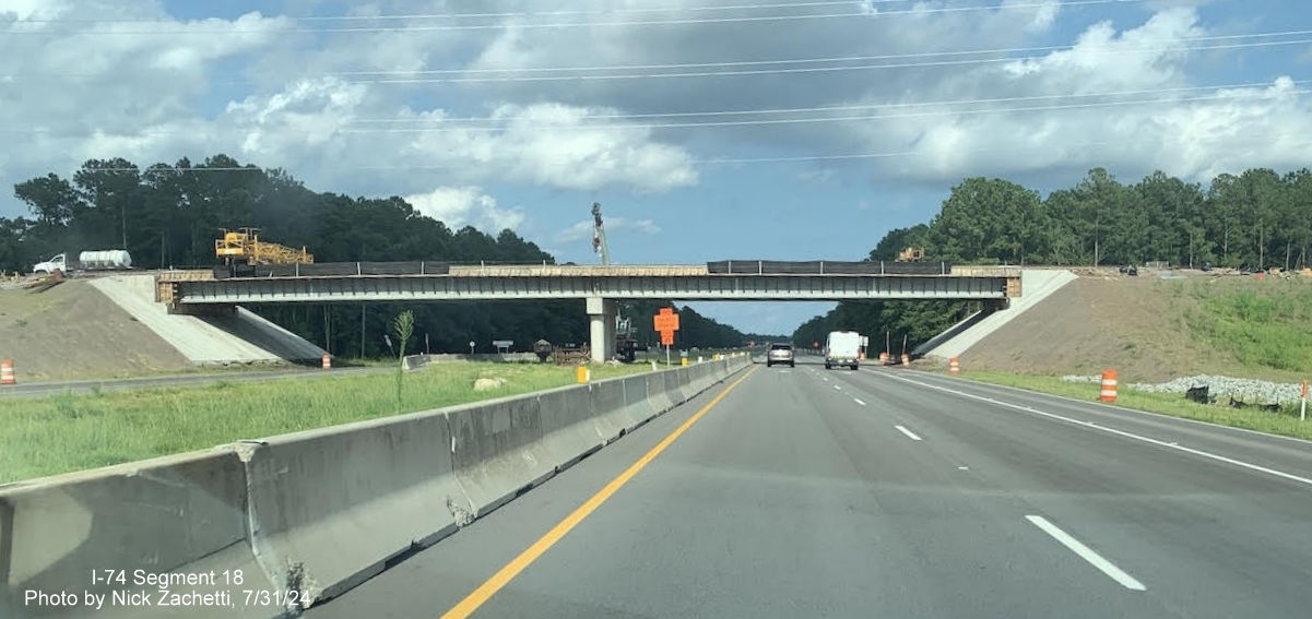 Image of new bridge being constructed for future Lake Waccamaw interchange on US 74/76 (Future I-74) 
       East in Columbus County, Nick Zachetti, July 2024