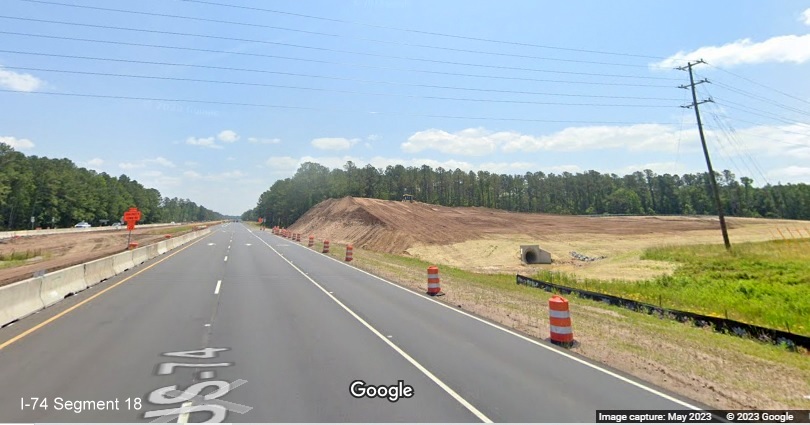 Image of future Lake Waccamaw interchange bridge being built near Chauncey Town Road 
          along US 74/76 East, Google Maps Street View, May 2023